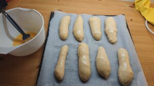 8 slightly bigger dough sausages.
